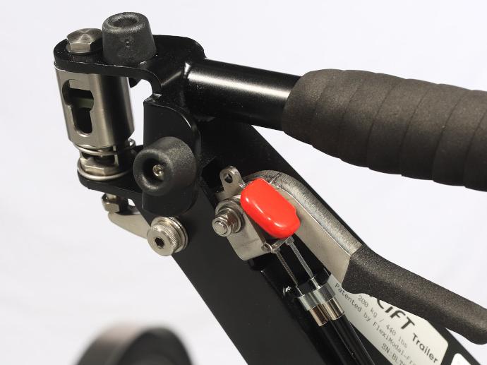 Parking brake and coupling of the BicyLift bike trailer